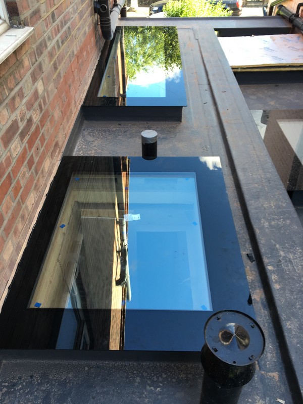 Multiple flat roof skylights on extension in Oxford